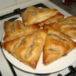 Golden and flaky apple turnovers filled with a warm spiced apple filling.